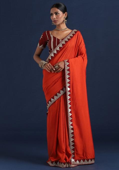 Rust Embellished Silk Saree Set — view on Indya