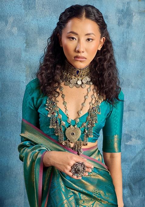 Teal Green Woven Design Silk Saree Set — view on Indya