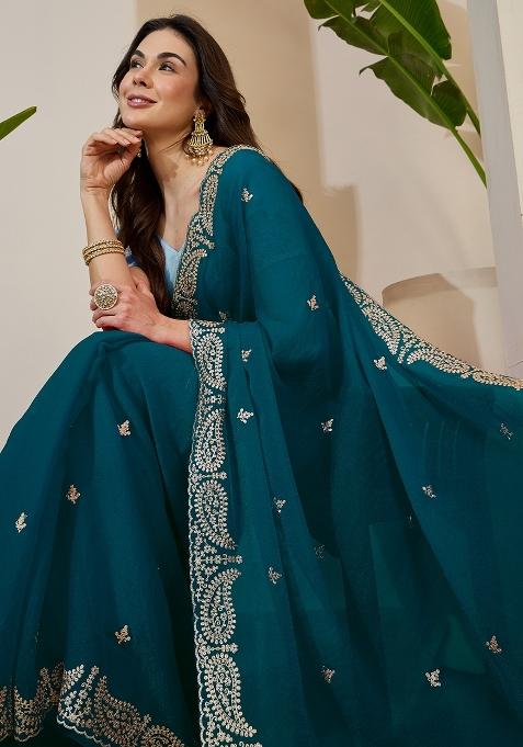 Teal Blue Embroidered Tissue Saree Set — view on Indya