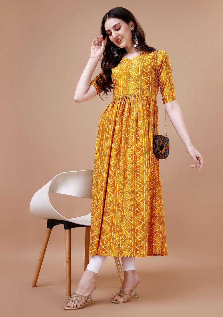 Yellow Printed Rayon Kurti - Indya