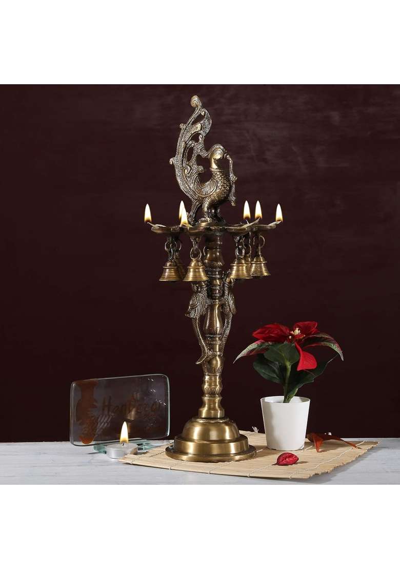 Two Moustaches Brass Peacock Deepak Stand with Bells Brass Peacock Diya 7 X 7 X 18 Inches Brass Diya for Puja - Indya