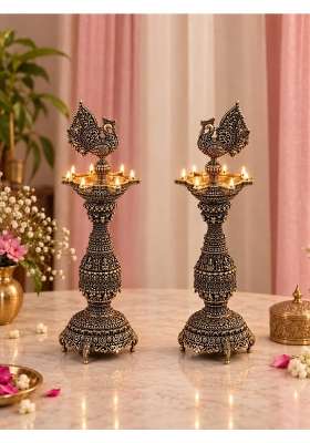 Superfine Peacock Brass Oil Wick Diya Pair with Intricate Carvings Set of 2