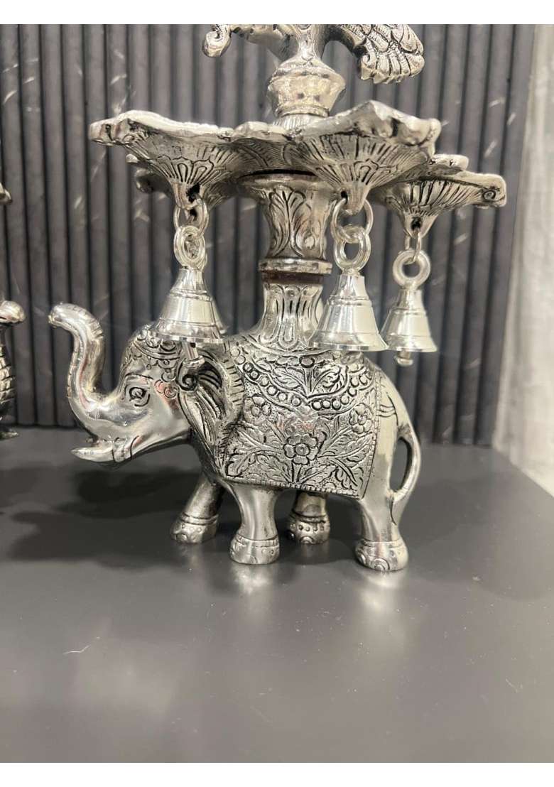 Mishita Collections German Silver Peacock Samai Pair Diya Stand with Elephant Base and Plate Pack of 2 - Indya