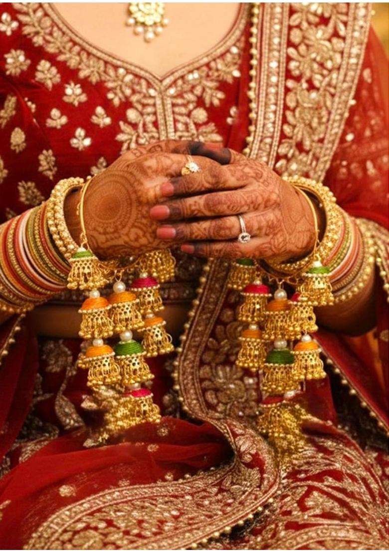 Advika Creations Multicolor Jhumka Kaleera in Golden Finish with Traditional Bridal Charms - Indya