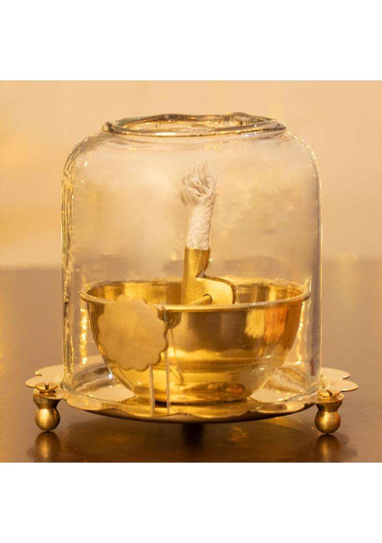 The Advitya Golden Brass Akhand Diya for Pooja with Adjustable Bati Knob and Glass Cover - Indya