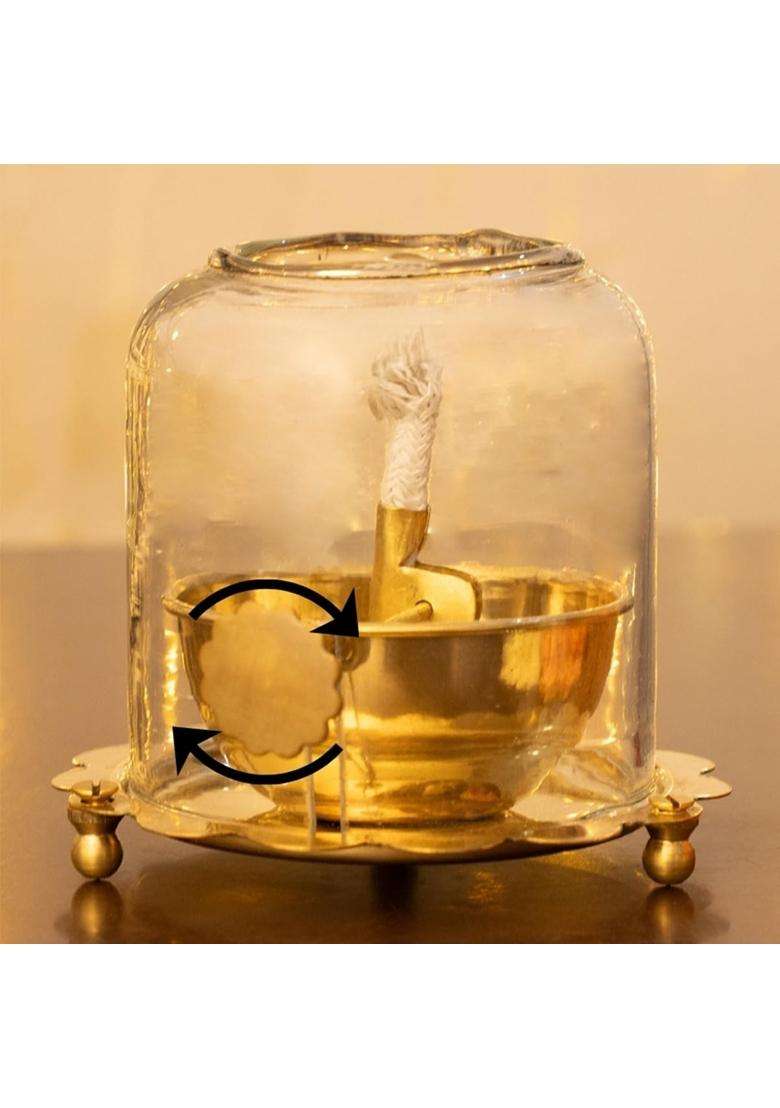 The Advitya Golden Brass Akhand Diya for Pooja with Adjustable Bati Knob and Glass Cover - Indya