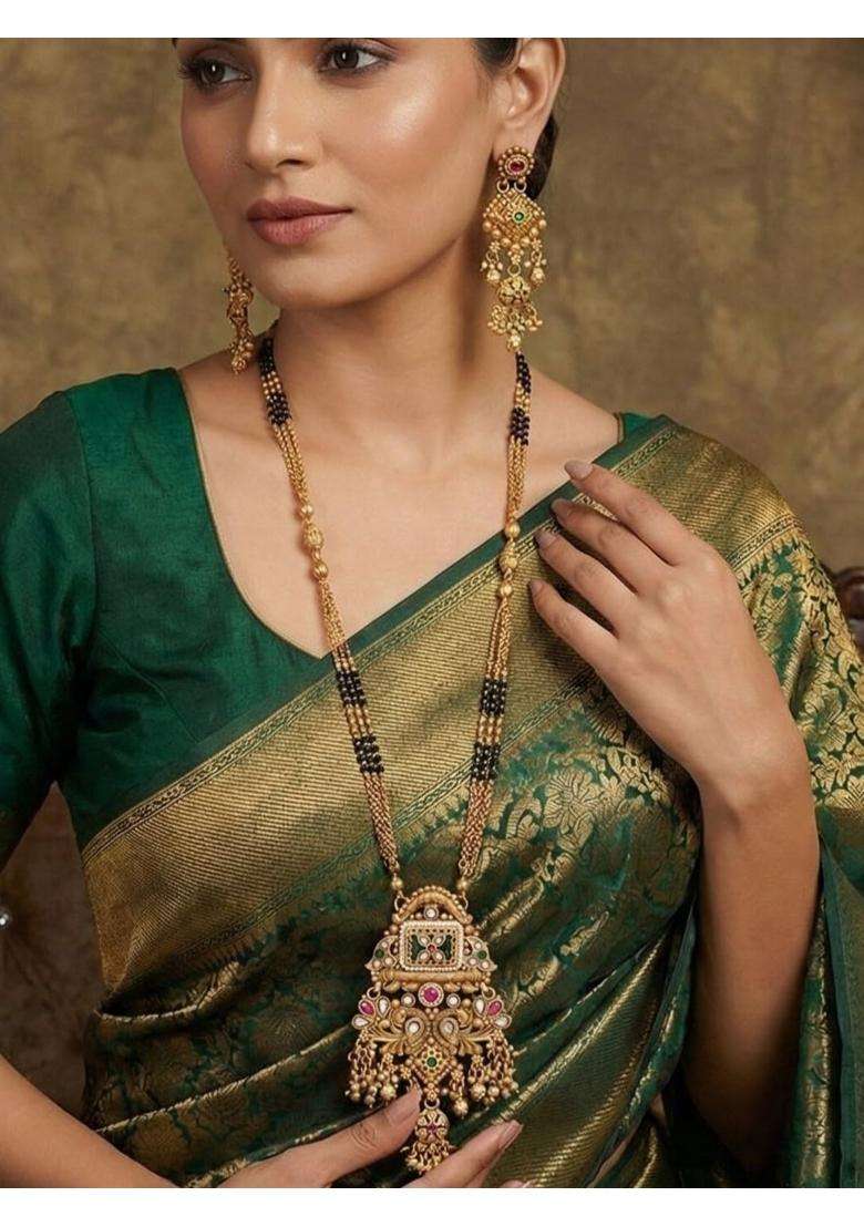 Jewwel Traditional Gold Plated Black Bead Mangalsutra Set with Ruby and Emerald Coloured Stones - Indya