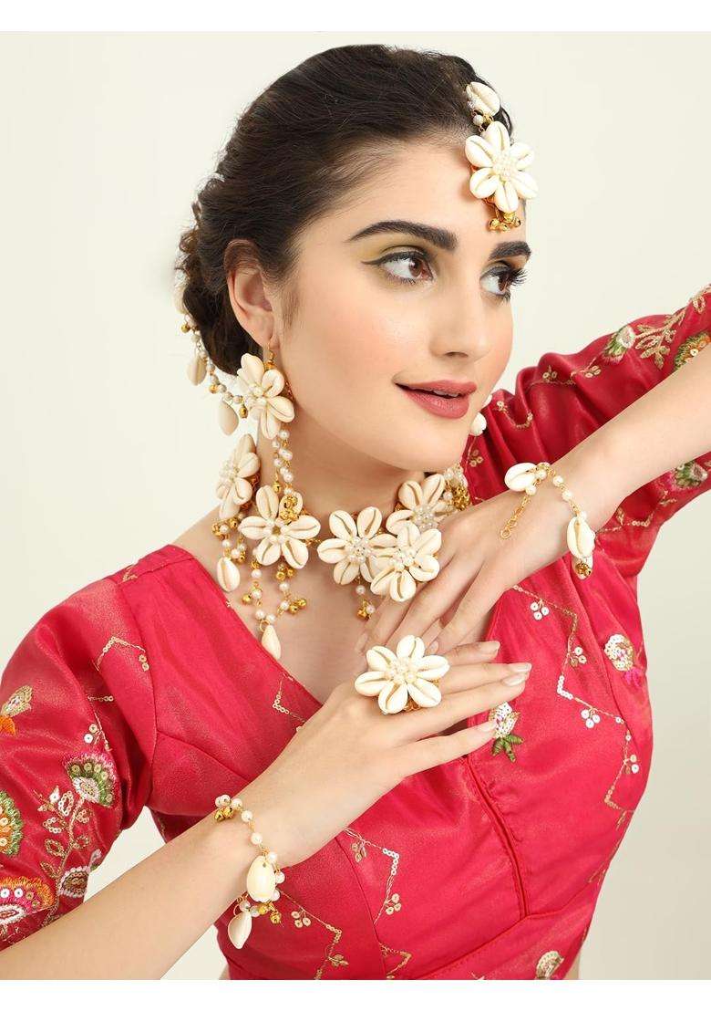 NMII Traditional Kaudi Sea Shell Golden Bells and White Moti Pearls Jewellery Set for Bridal Women and Girls - Indya