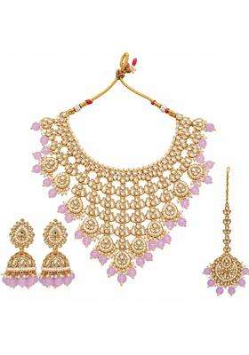 Kundan Bridal Jewellery Set with Jhumka Earrings and Maang Tikka by Aksharas