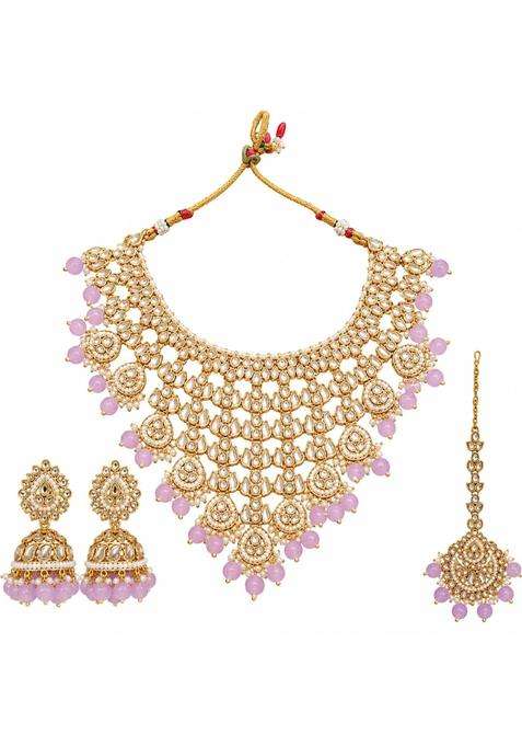 Kundan Bridal Jewellery Set with Jhumka Earrings and Maang Tikka by Aksharas