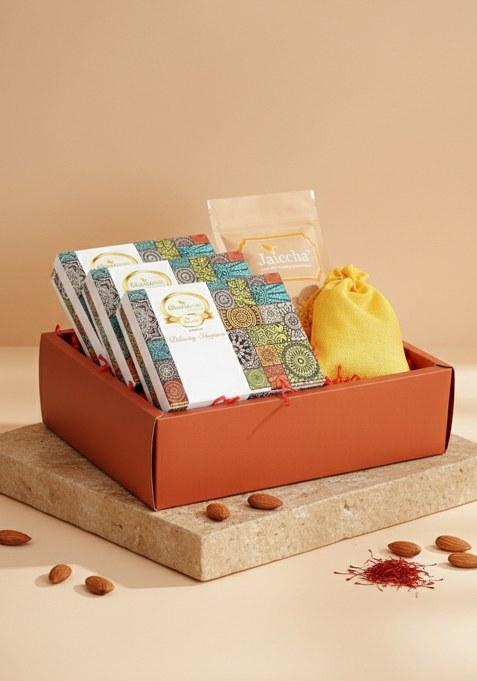 Ghasitaram Lohri Hamper Box Of Til Laddoo, Khajoor, Gachak, Revadi Pouch And Namkeen
