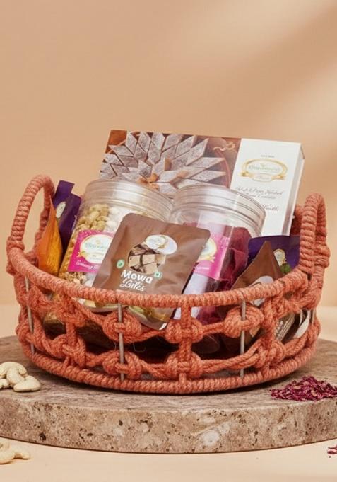 Ghasitaram Orange Jute Basket With Kaju Katlis/ Namkeen And Bites