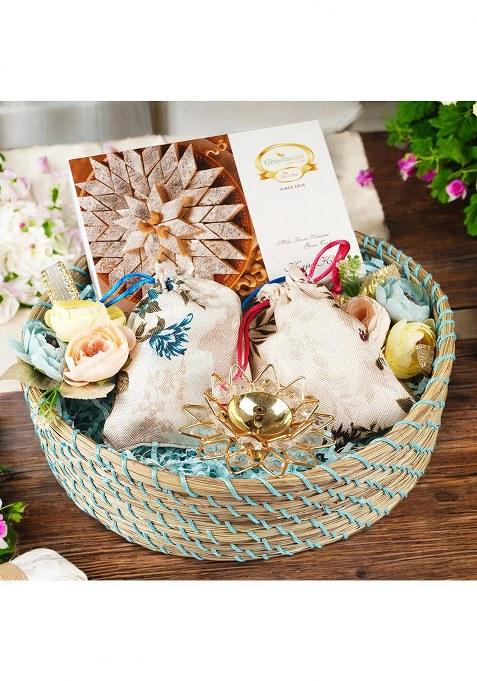 Ghasitaram Blue Jute Basket Of Kaju Katli , 2 Pouches Dryfruits And A Diya