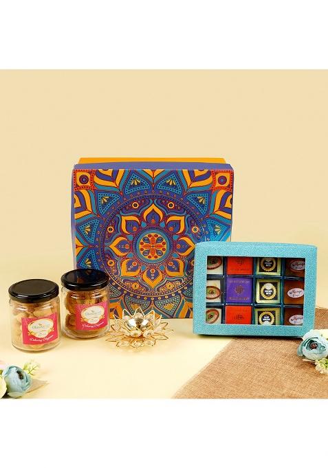 Ghasitaram Diwali Hamper Box Of Kaju Katli, 2 Jars Dryfruits And Diya