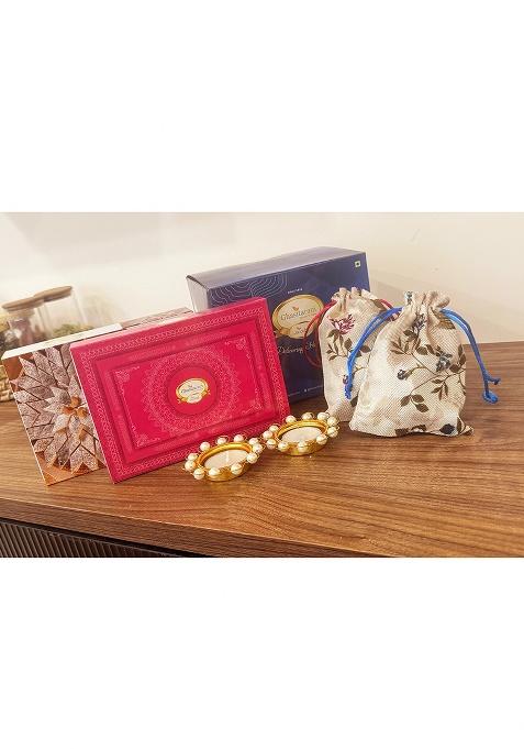 Ghasitaram Blue Box Of Kaju Katli, Milk Cake, Almonds And Flavour Raisins In Jute Pouch And...