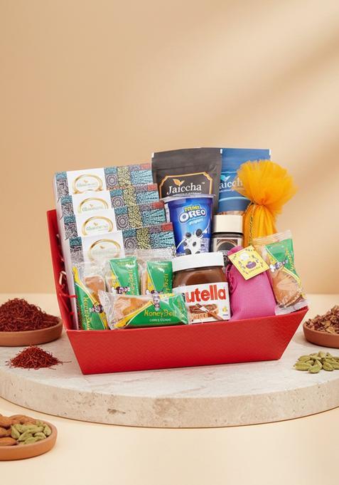 Ghasitaram Holi Sweets| Hampers| Gifts Pink Hamper Basket Of 16 Goodies