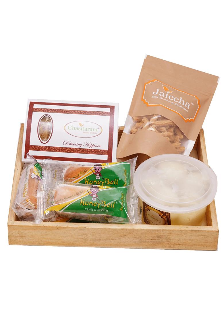 Ghasitaram Holi Sweets| Hampers| Gifts-Wooden Basket Of Gujiyas, Butter Chakli, Rasgulla And Cake