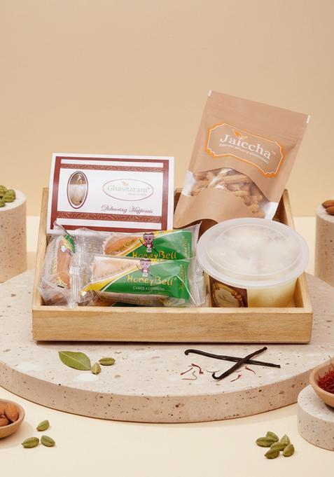 Ghasitaram Holi Sweets| Hampers| Gifts-Wooden Basket Of Gujiyas, Butter Chakli, Rasgulla And Cake