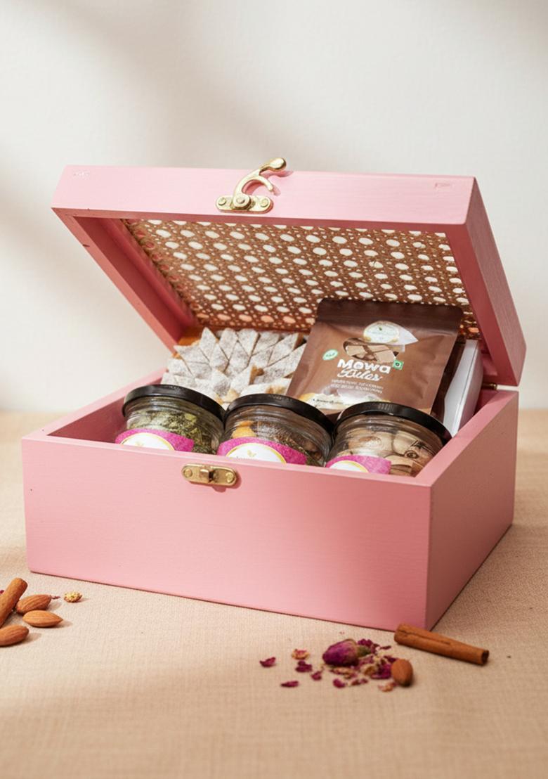 Ghasitaram Diwali Gifts-Pink Cane Rattan Box With Kaju Katli, Paan Raisins, Crunchy Cashew, Pista And Mewa...