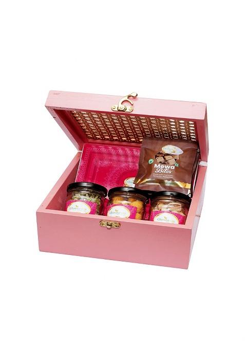 Ghasitaram Diwali Gifts-Pink Cane Rattan Box With Kaju Katli, Paan Raisins, Crunchy Cashew, Pista And Mewa...