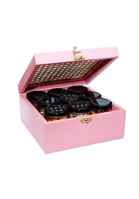 Ghasitaram Unique Diwali Gifts-Diwali Dryfruits-Pink Cane Rattan Box Of 9 Dryfruit Jars