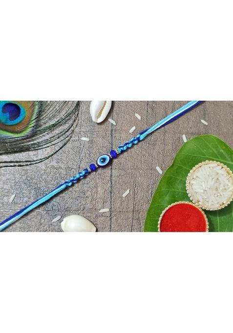 Yuvraj Evil eyes design rakhi for brother & sweets Chocolate soan papdi 200 gm box with roli chawal pack