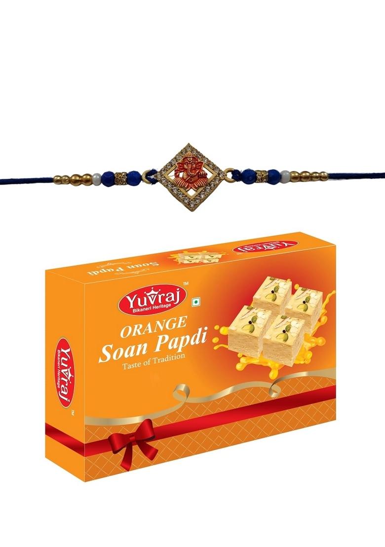 Yuvraj Ganpati design rakhi for brother & sweets orange soan papdi 200 gm box with roli chawal pack