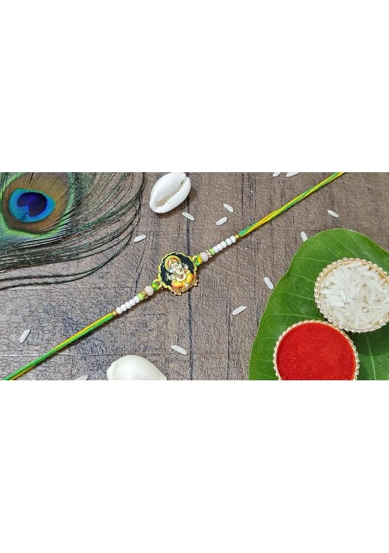 Yuvraj Ganesha design rakhi for brother & sweets soan papdi 200 gm box with roli chawal pack