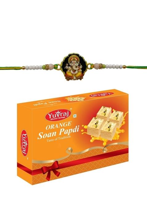 Yuvraj Ganesha design rakhi for brother & sweets orange soan papdi 200 gm box with roli chawal pack