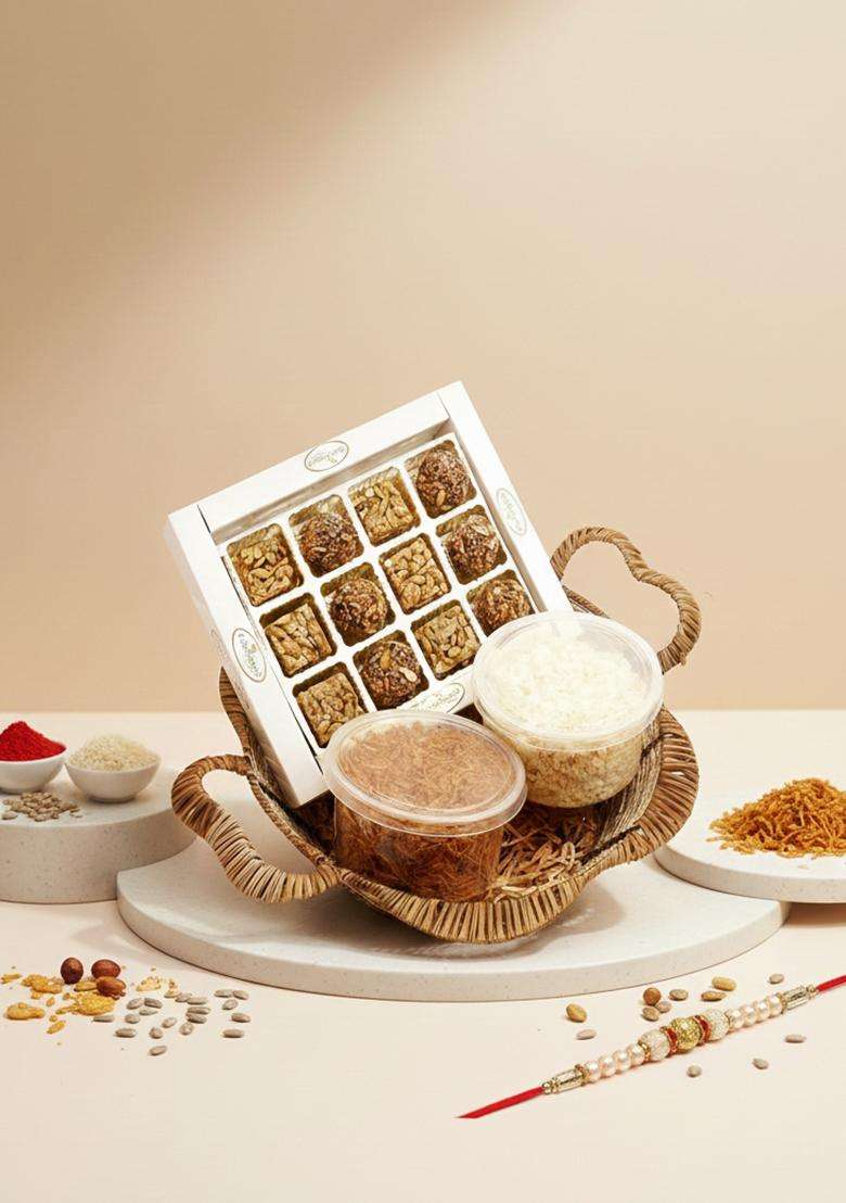 Ghasitaram Gifts Rakhi for Brothers Gold Cane Finish Basket of Healthy Seeds Sweets Box, Diet Chiwda and SOYA Sev with 2 Pearl Rakhis - Indya