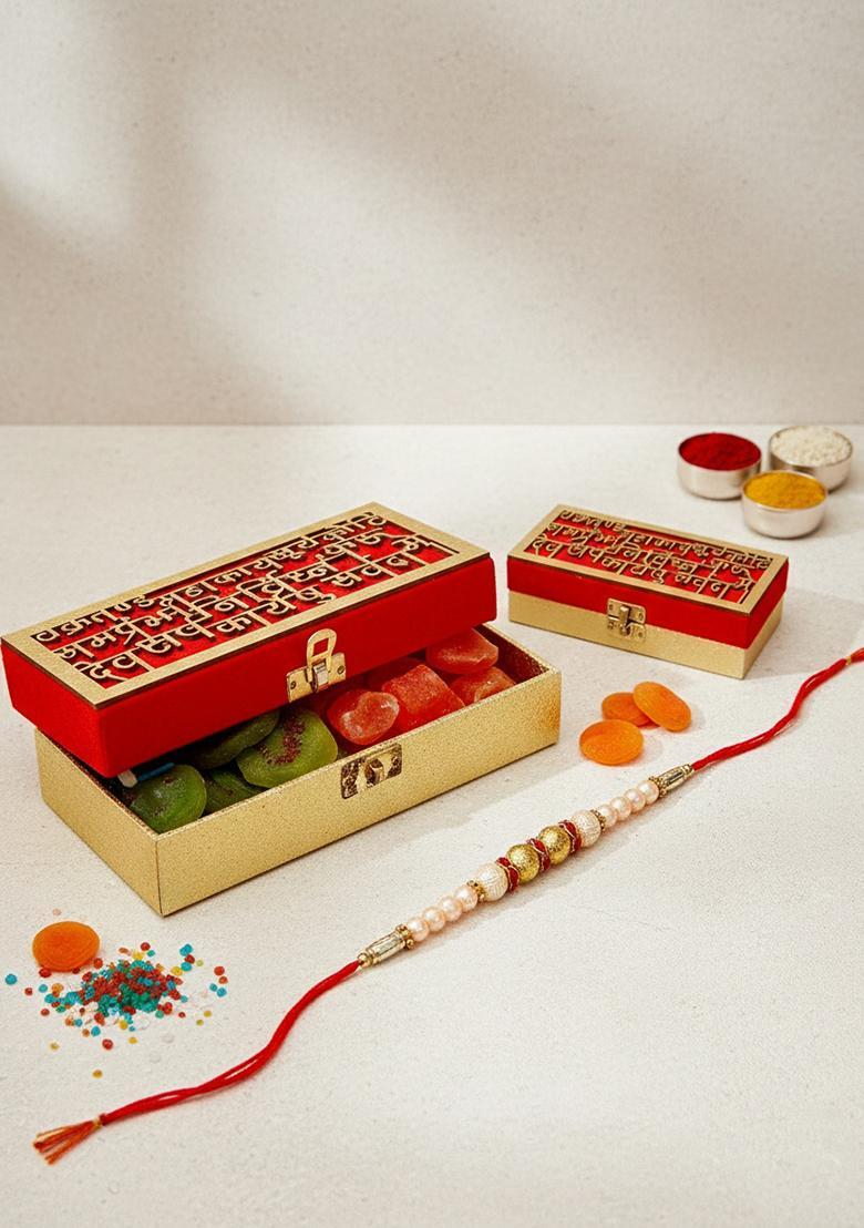 Ghasitaram Gifts Rakhi for Brothers Dryfruits-Wakrakund Sun Dried Kiwi and Papaya Box with Pearl