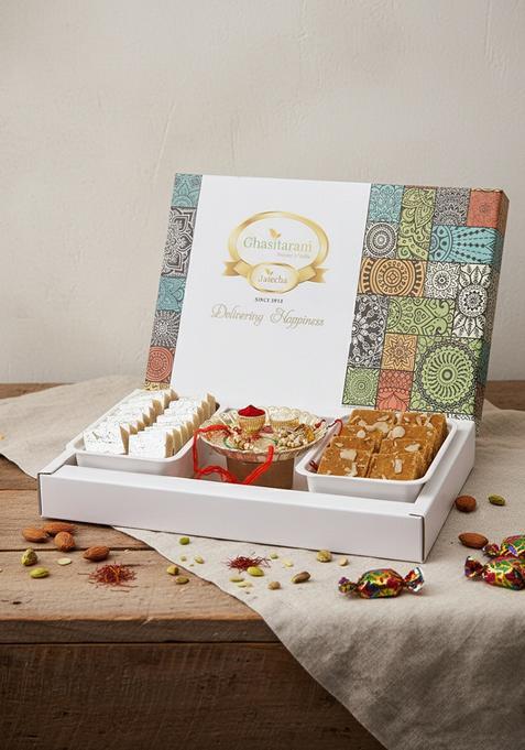 Ghasitaram Gifts Rakhi for Brothers Assorted Box of Kaju Katlis, Besan Barfi, Pooja Thali and Bhaiya Bhabhi Rakhis