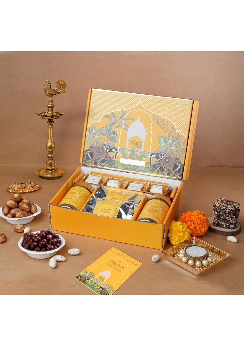 Oriole Gifts Diwali Gift Hamper for Family, Friends & Corporate| Premium Chocolates, Almond Brittles, Jowar Puffs, Paan Shots, Turkish Coffee Nutties, Decorative Diya Greeting Card | Festive Yellow-Golden Box Employees, Clients, Staff - Indya