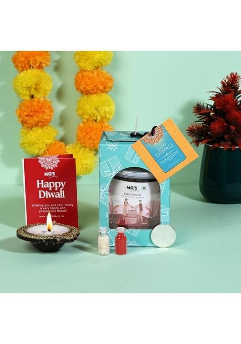 Mo's Premium Diwali Gift box with Ragi Cookies | Deepawali Diya, Roli Tikka Chawal and Pooja Coin in Stylish Potli Pouch & Geetings Card Healthy for Family Friends Festive Gifts