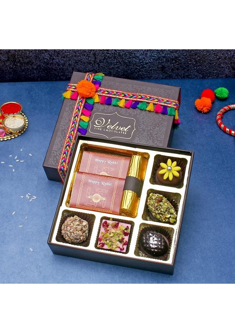 Velvet Fine Chocolates Rakhi Gift Hampers Pack for Brother & Sister | Box with 5 Assorted Chocolates, 1 Cranberry Log, Hazelnut Chocolate Bar, Orange Bar