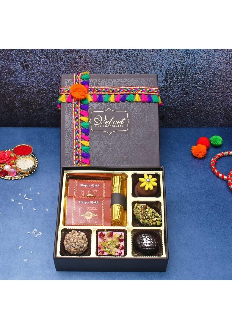 Velvet Fine Chocolates Rakhi Gift Hampers Pack for Brother & Sister | Box with 5 Assorted Chocolates, 1 Cranberry Log, Hazelnut Chocolate Bar, Orange Bar