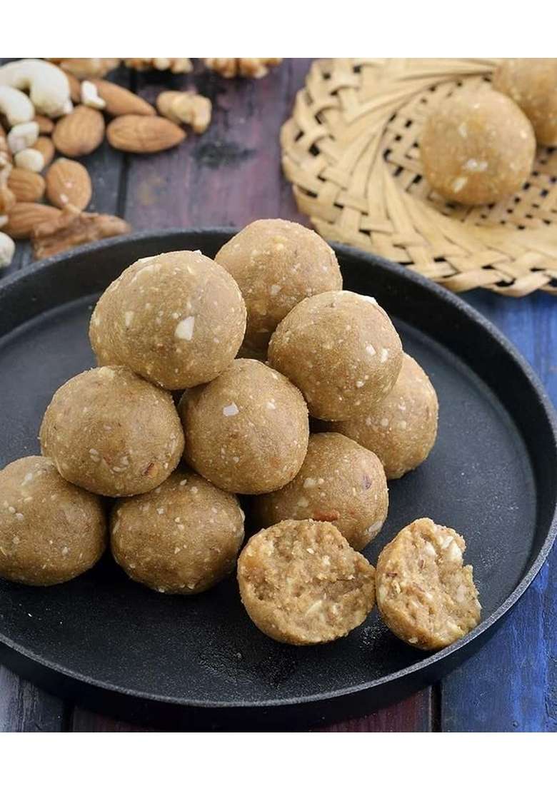 OM SWEETS & SNACKS Panjeeri Laddoo | Made With Premium Ingredients No Added Colours Or Preservatives Rich In Carbohydrates Proteins Fresh Products Indian Mithai Pure Desi Ghee Pack of 1 X 800gm - Indya