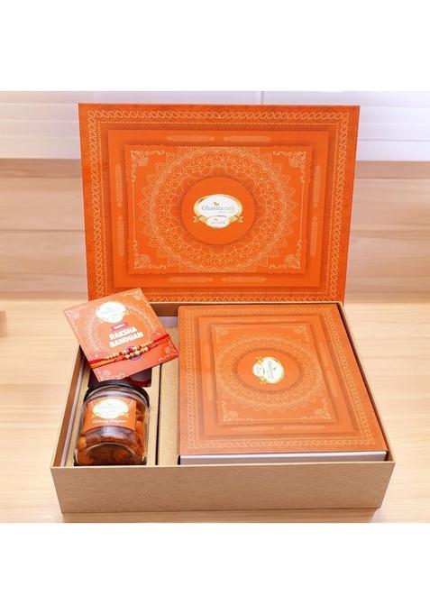 Ghasitaram Gifts Rakhi for Brothers Orange Hamper Box with Exotic Sweets, 2 rakhis, Card and a Mixed Dryfruit Jar