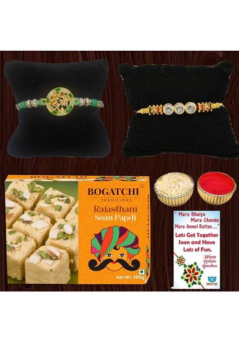Bogatchi Raksha Bandhan Gift Box 2 Designer Rakhis With Soan Papdi, Roli Chawal & Card For Bhai Bhabhi (Pack Of 1, 200G)