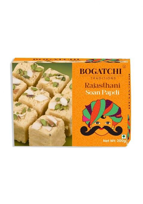 Bogatchi Raksha Bandhan Gift Box 2 Designer Rakhis With Soan Papdi, Roli Chawal & Card For Bhai Bhabhi (Pack Of 1, 200G)