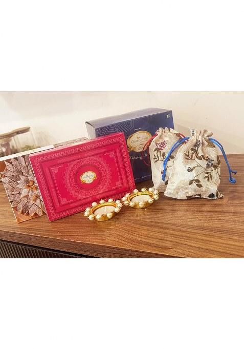 Jaiccha Ghasitaram Gifts Blue Box Of Kaju Katli, Milk Cake, Almonds,Flavour Raisins In Jute Pouch And T-Lights|Gift Hamper|Diwali Gift Hamper|Food Hampers|Gourmet Hampers|