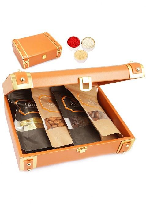 Jaiccha Ghasitaram Bhaidooj Gifts Orange Trunk Box Of Almonds, Mewa Bites, Banarsi Flavoured And Chocolate Coated Almondss