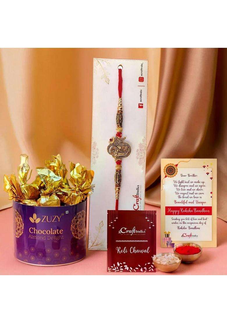 Ecraftindia Golden Lord Ganesha Om Designer Rakhi For Brother With Chocolate, Zuzy Almond Chocolate Box, Gift - Roli Chawal Pack, Raksha Bandhan Greeting Card - Indya