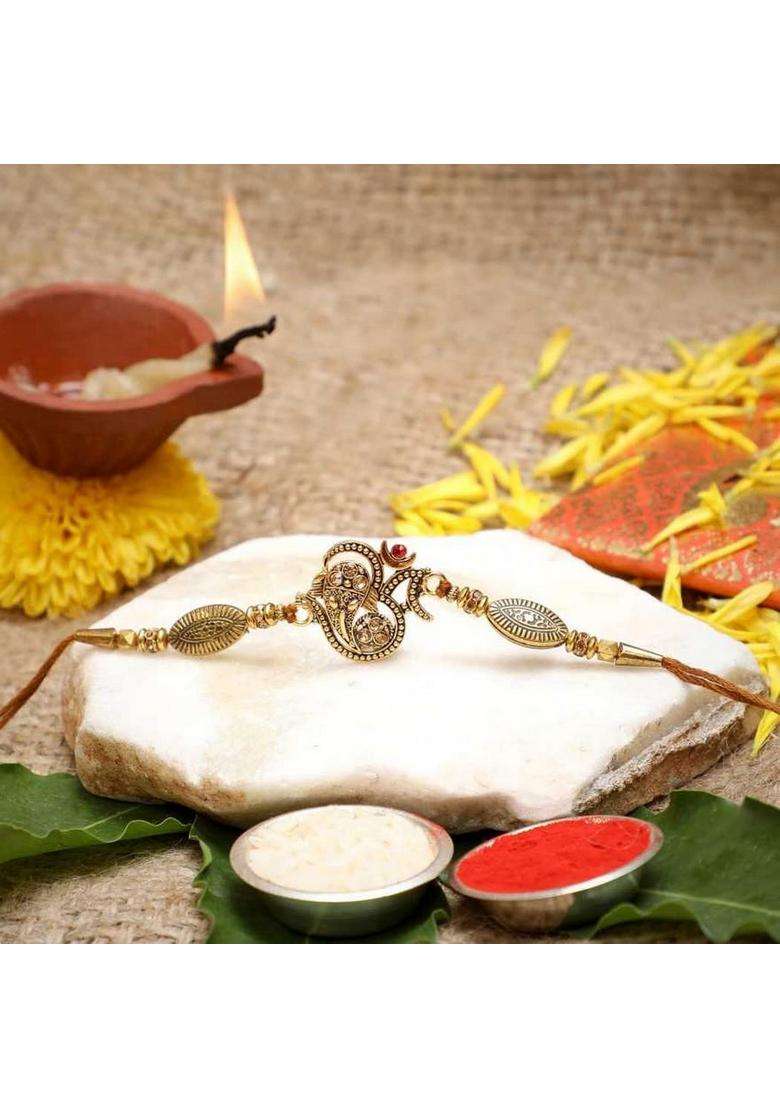 Ecraftindia Golden Lord Ganesha Om Designer Rakhi For Brother With Chocolate, Zuzy Almond Chocolate Box, Gift - Roli Chawal Pack, Raksha Bandhan Greeting Card - Indya