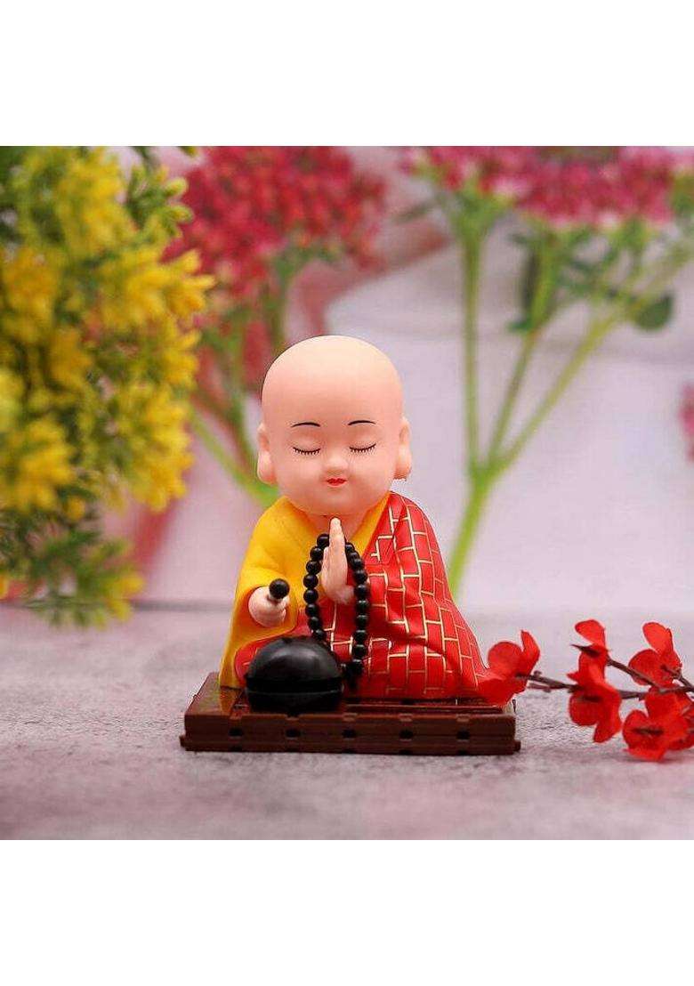 Oblivion Solar Powered Sitting Buddha Statue Head And Hand Moving Buddha Statue Decorative Showpiece - 14 Cm(Resin Red) - Indya
