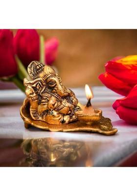 Sp Handicrafts Leaf Ganesh With Diya Lord Ganesha Metal Hand Craved For Home Decorative Gift Puja Diwali Gift Decorative Showpiece - 9 Cm(Aluminium Gold)