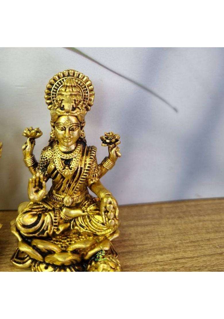 Aakrati Brass Lakshmi And Ganesh Pair Elegant Statues Of Brass Temple Decor Decorative Showpiece - 5.08 Cm(Brass Yellow) - Indya
