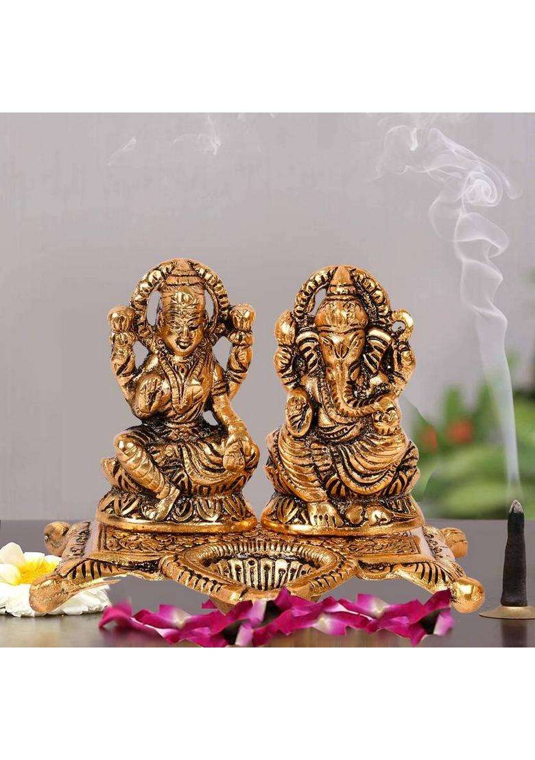 Kitlyn Mata Lakshmi With Ganesha God Idol Deepam Oil Lamp For Or Bringing Decorative Showpiece - 10 Cm(Brass Gold) - Indya