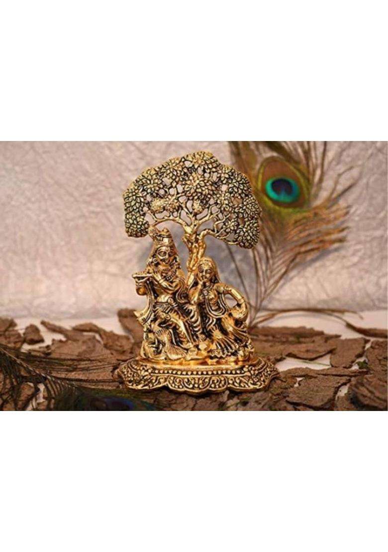 Vac International Metal Radha Krishna Sitting Under Tree Plying Flute Brass Idol For Home Decor Decorative Showpiece - 19 Cm(Brass Gold) - Indya