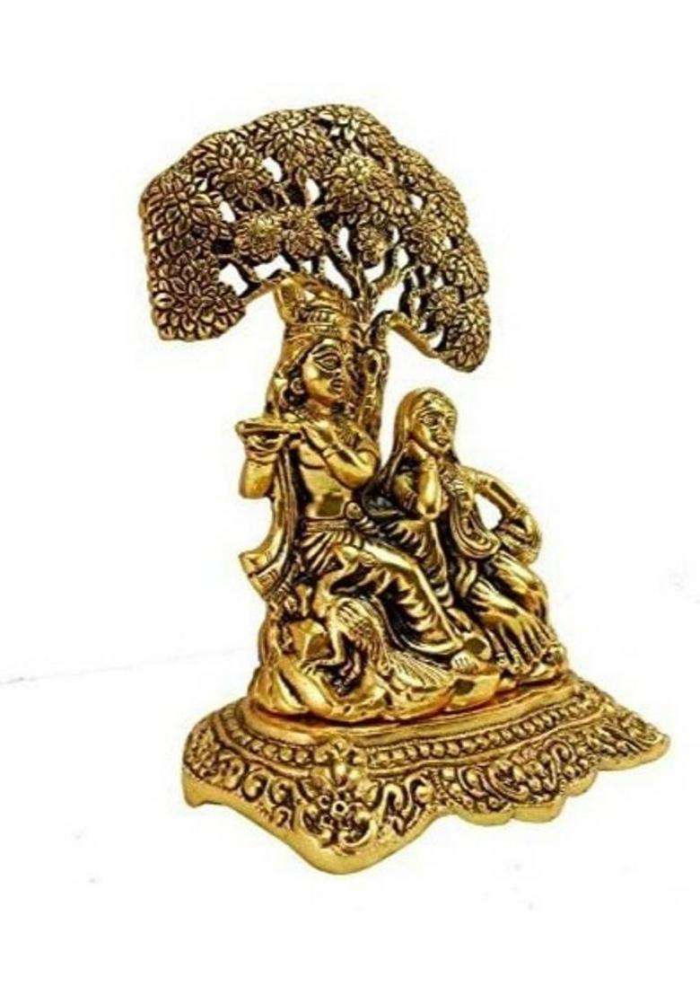Vac International Metal Radha Krishna Sitting Under Tree Plying Flute Brass Idol For Home Decor Decorative Showpiece - 19 Cm(Brass Gold) - Indya